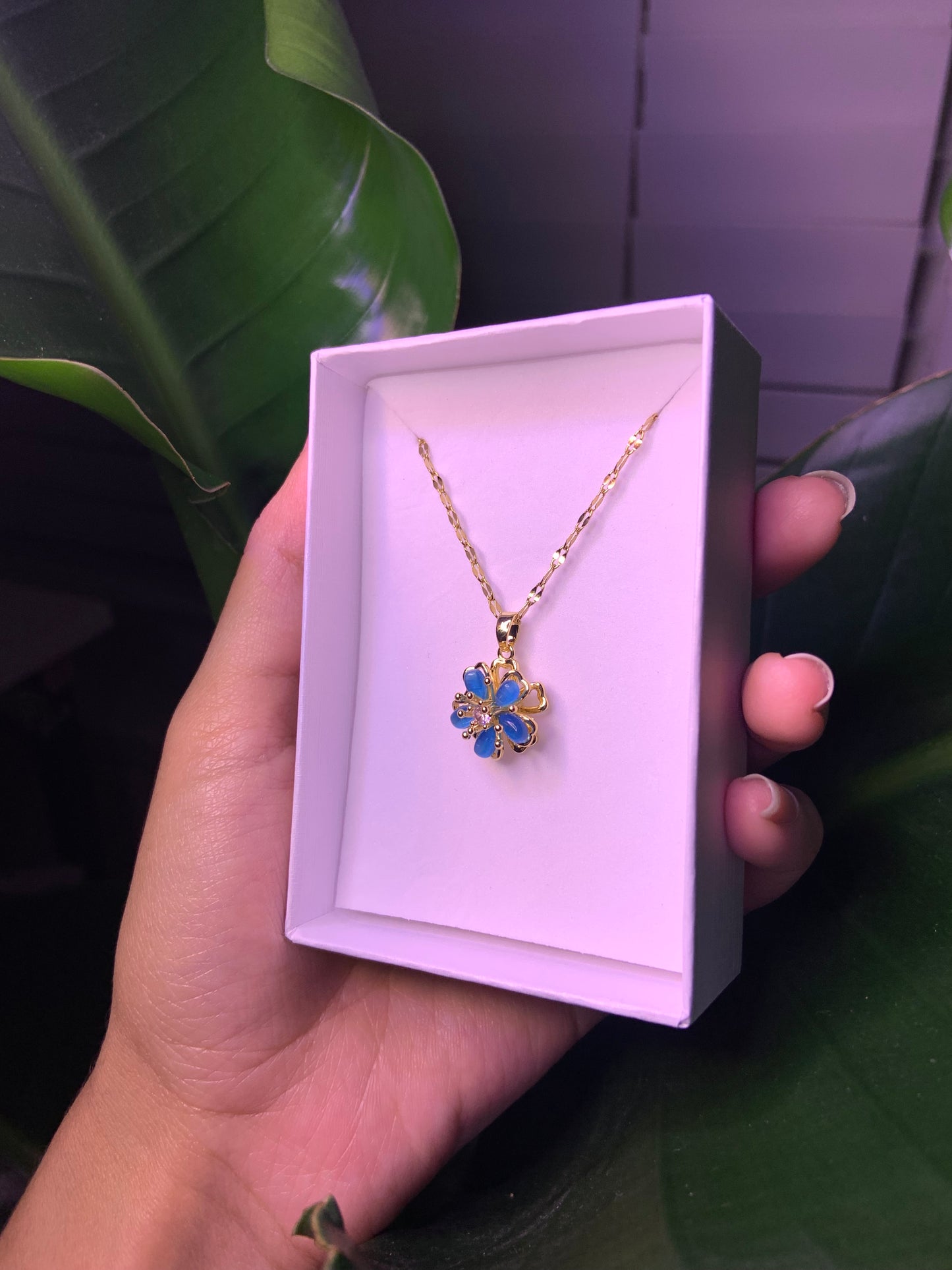 Spinning Blue Gold Plated Flower